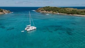 default Catamaran anchored in turquoise waters, showcasing Josh Rundle Sailing Education’s expert instruction and charter services.